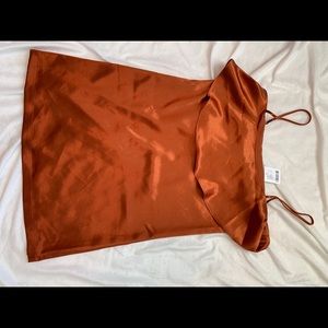 Orange dress with ruffle overlay